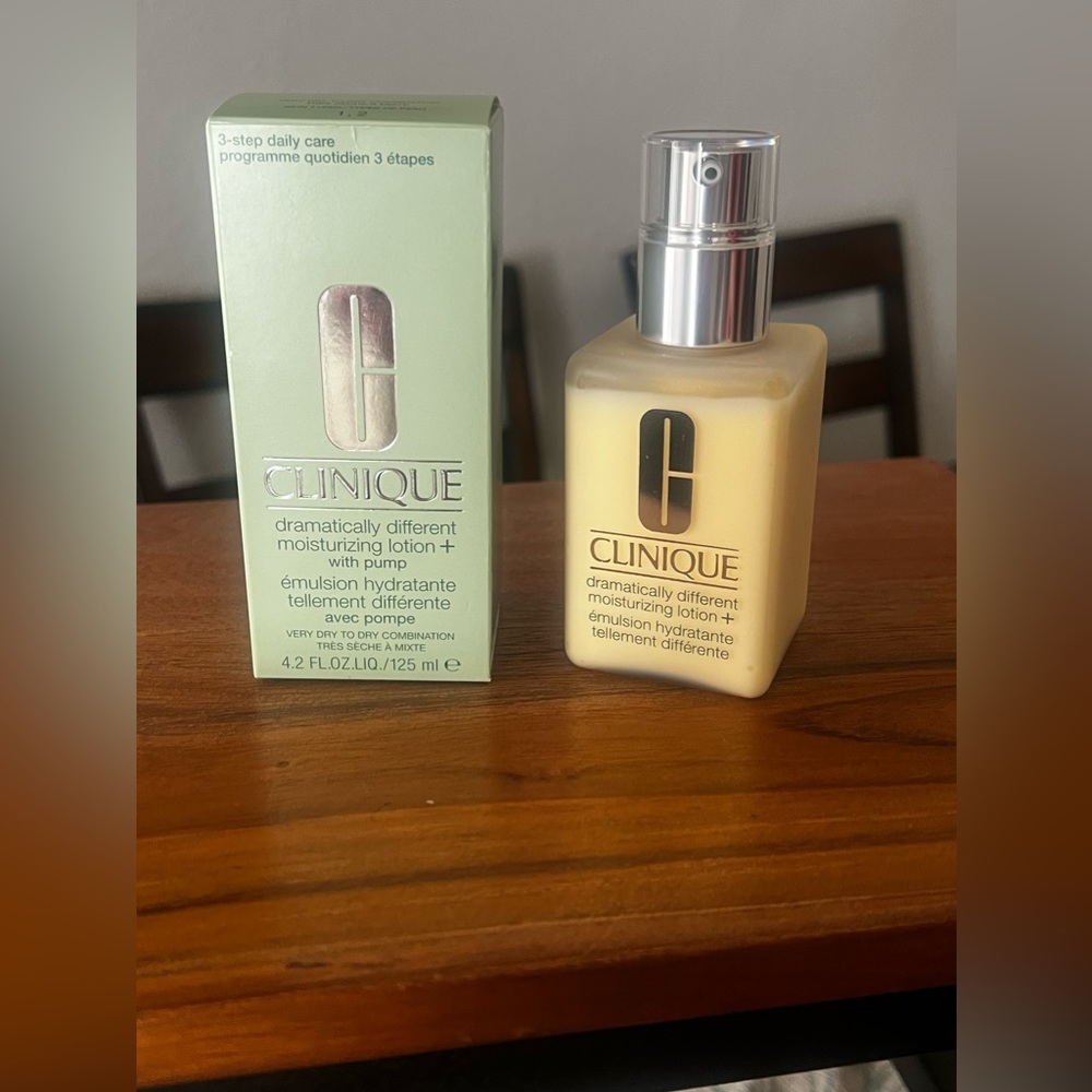 Brand new Clinique moisturizing lotion with pump in a box.